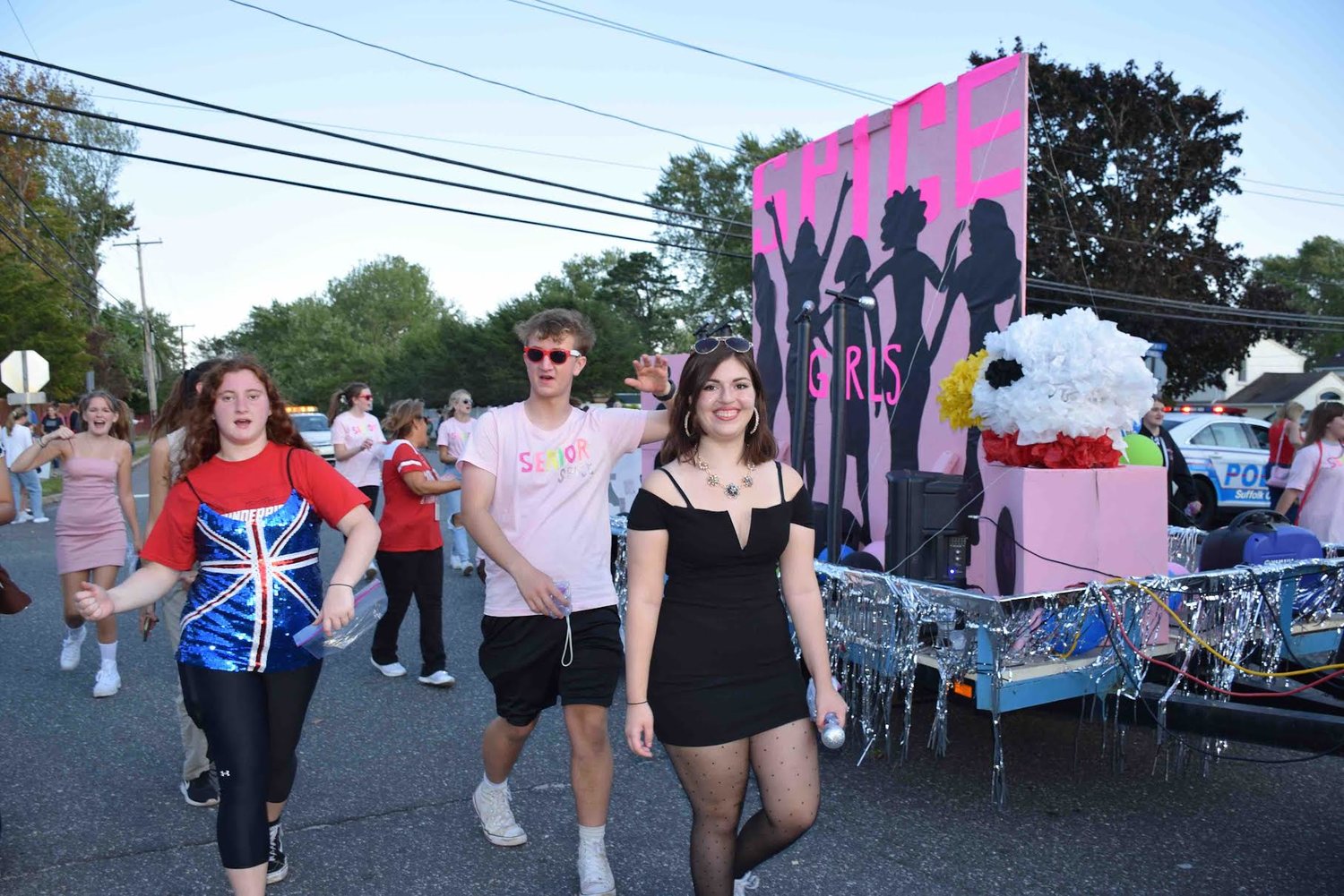 The seniors walked with their Spice Girls-themed float during homecoming.